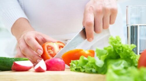 Vegetables are cut with a knife